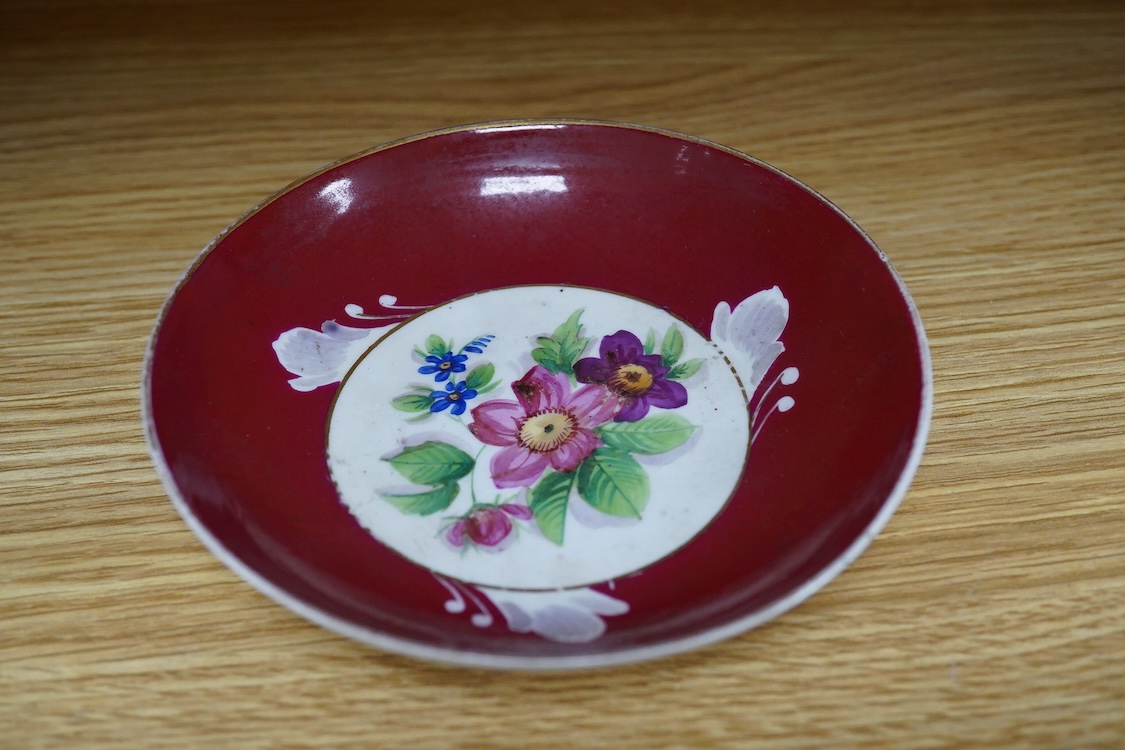 An 18th century Delft plate, two tin-glazed dishes and candlestick, a Gardener Russian porcelain tea cup and saucer, and a mug with liner, largest 22cm in diameter